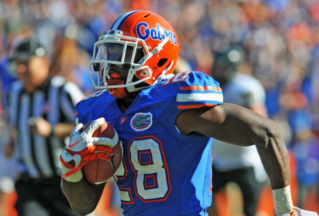 GAINESVILLE, FL -  NOVEMBER 5:  Running back Jeff Demps #28 of the Florida Gators runs for a 52-yard touchdown against the Vanderbilt Commodores November 5, 2011 at Ben Hill Griffin Stadium in Gainesville, Florida.  Demps scored in the second quarter. (Photo by Al Messerschmidt/Getty Images)