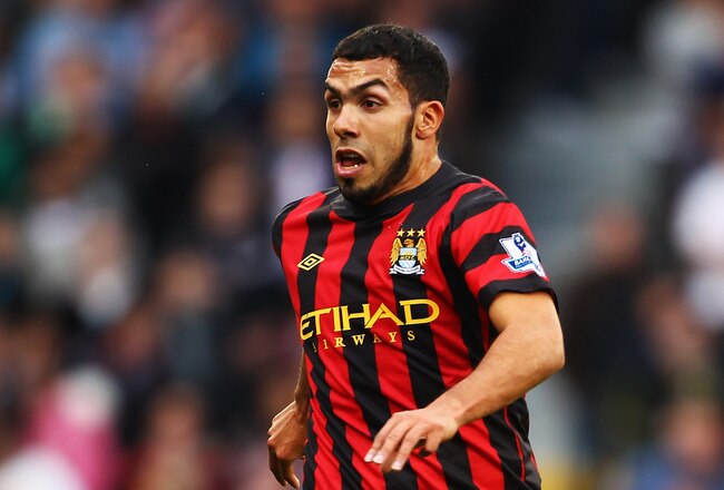 LONDON, ENGLAND - SEPTEMBER 18:  Carlos Tevez of Manchester City runs with the ball during the Barclays Premier League match between Fulham and Manchester City at Craven Cottage on September 18, 2011 in London, England.  (Photo by Julian Finney/Getty Images)