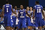 LOS ANGELES, CA - NOVEMBER 15:  James Gallman #3 of the Middle Tennessee State Blue Raiders greets teamates LaRon Dendy #1 and Shawn Jones #12 as they come off the floor during a time out against the UCLA Bruins at LA Sports Arena on November 15, 2011 in Los Angeles, California.  (Photo by Stephen Dunn/Getty Images)