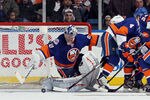 UNIONDALE, NY - FEBRUARY 11:  Evgeni Nabokov #20 of the New York Islanders makes a save against the Los Angeles Kings on February 11, 2012 at Nassau Coliseum in Uniondale, New York. The Islanders defeated the Kings 2-1 in overtime.  (Photo by Jim McIsaac/Getty Images)