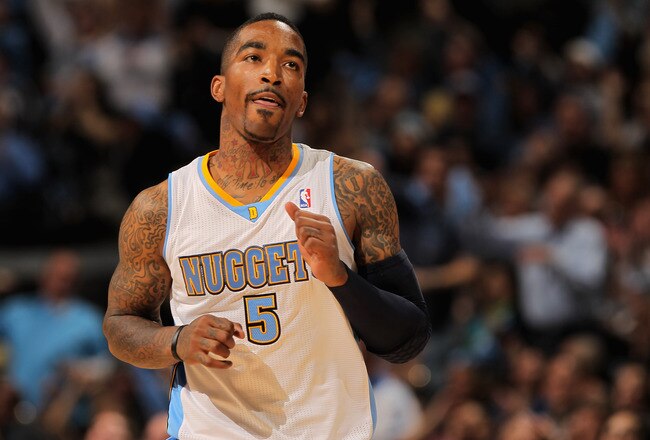 DENVER, CO - APRIL 23:  J.R. Smith #5 of the Denver Nuggets celebrates a three point shot against the Oklahoma City Thunder in Game Three of the Western Conference Quarterfinals in the 2011 NBA Playoffs on April 23, 2011 at the Pepsi Center in Denver, Colorado. NOTE TO USER: User expressly acknowledges and agrees that, by downloading and or using this photograph, User is consenting to the terms and conditions of the Getty Images License Agreement.  (Photo by Doug Pensinger/Getty Images)