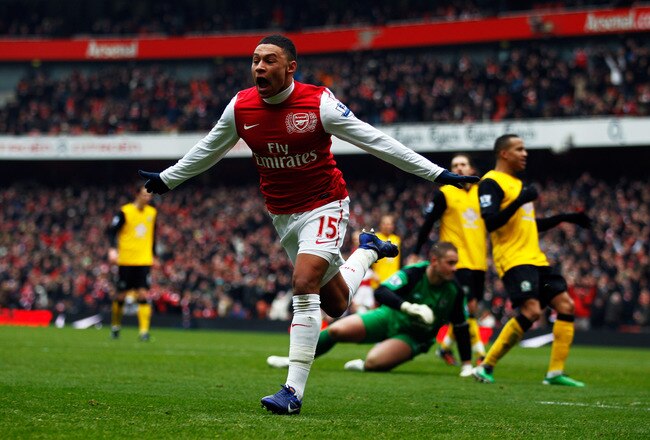 LONDON, ENGLAND - FEBRUARY 04:  Alex Oxlade-Chamberlain of Arsenal celebrates after he scored their third goal during the Barclays Premier League match between Arsenal and Blackburn Rovers at Emirates Stadium on February 4, 2012 in London, England.  (Photo by Paul Gilham/Getty Images)
