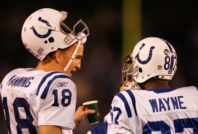 SAN DIEGO - JANUARY 03:  Wide receiver Reggie Wayne #87 of the Indianapolis Colts talks with quaterback Peyton Manning #18 during the AFC Wild Card Game against the San Diego Chargers on January 3, 2009 at Qualcomm Stadium in San Diego, California.  (Photo by Harry How/Getty Images)