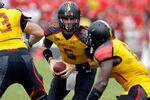 COLLEGE PARK, MD - SEPTEMBER 24: Quarterback Danny O'Brien #5 of the Maryland Terrapins hands the ball off against the Temple Owls at Byrd Stadium on September 24, 2011 in College Park, Maryland.  (Photo by Rob Carr/Getty Images)