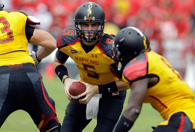 COLLEGE PARK, MD - SEPTEMBER 24: Quarterback Danny O'Brien #5 of the Maryland Terrapins hands the ball off against the Temple Owls at Byrd Stadium on September 24, 2011 in College Park, Maryland.  (Photo by Rob Carr/Getty Images)