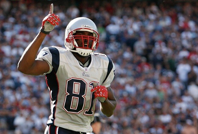 FOXBORO, MA - SEPTEMBER 23:  Randy Moss #81 of the New England Patriots celebrates his touchdown during a game against the Buffalo Bills at Gillette Stadium on September 23, 2007 in Foxboro, Massachusetts.  (Photo by Jim Rogash/Getty Images)