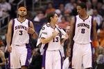 PHOENIX, AZ - FEBRUARY 09:  (L-R) Jared Dudley #3, Steve Nash #13 and Channing Frye #8 of the Phoenix Suns during the NBA game against the Houston Rockets at US Airways Center on February 9, 2012 in Phoenix, Arizona. The Rockets defeated the Suns 96-89. NOTE TO USER: User expressly acknowledges and agrees that, by downloading and or using this photograph, User is consenting to the terms and conditions of the Getty Images License Agreement.  (Photo by Christian Petersen/Getty Images)