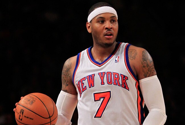NEW YORK, NY - JANUARY 09: Carmelo Anthony #7 of the New York Knicks dribbles against the Charlotte Bobcats at Madison Square Garden on January 9, 2012 in New York City. NOTE TO USER: User expressly acknowledges and agrees that, by downloading and or using this photograph, User is consenting to the terms and conditions of the Getty Images License Agreement.  (Photo by Chris Trotman/Getty Images)