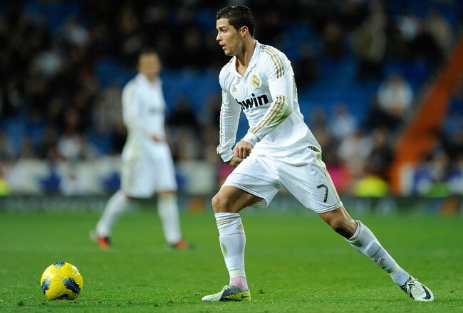 MADRID, SPAIN - JANUARY 28: Cristiano Ronaldo of Real Madrid in action during the La Liga match between Real Madrid and Real Zaragoza at Estadio Santiago Bernabeu on January 28, 2012 in Madrid, Spain.  (Photo by Denis Doyle/Getty Images)