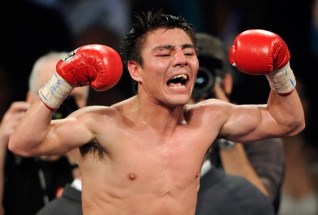 LAS VEGAS, NV - MAY 07:  Jorge Arce celebrates his 12th-round TKO victory over Wilfredo Vazquez in their WBO super bantamweight title fight at the MGM Grand Garden Arena May 7, 2011 in Las Vegas, Nevada.  (Photo by Ethan Miller/Getty Images)