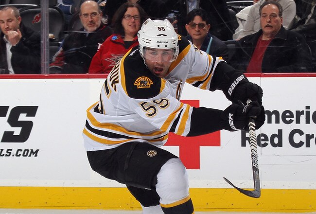 NEWARK, NJ - JANUARY 19: Johnny Boychuk #55 of the Boston Bruins skates against the New Jersey Devils at the Prudential Center on January 19, 2012 in Newark, New Jersey.  (Photo by Bruce Bennett/Getty Images)