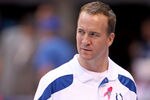 INDIANAPOLIS, IN - OCTOBER 09:  Peyton Manning of the Indianapolis Colts watches his team warm up before the NFL game against the Kansas City Chiefs at Lucas Oil Stadium on October 9, 2011 in Indianapolis, Indiana.  (Photo by Andy Lyons/Getty Images)
