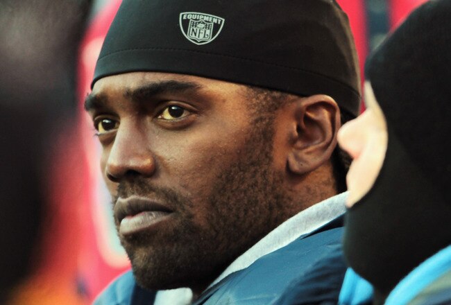 KANSAS CITY, MO - DECEMBER 26:  Receiver Randy Moss #84 of the Tennessee Titans watches from the sidelines during the game against the Kansas City Chiefs on December 26, 2010 at Arrowhead Stadium in Kansas City, Missouri.  (Photo by Jamie Squire/Getty Images)