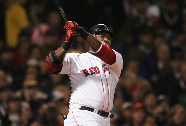 BOSTON - OCTOBER 23:  David Ortiz #34 of the Boston Red Sox hits a two run home run against the St. Louis Cardinals during the first inning of game one of the World Series on October 23, 2004 at Fenway Park in Boston, Massachusetts. (Photo by Stephen Dunn/Getty Images)