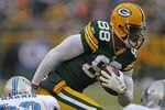 GREEN BAY, WI - JANUARY 01: Jermichael Finley #88 of the Green Bay Packers breaks away from Chris Harris #43 of the Detroit Lions for a first down at Lambeau Field on January 1, 2012 in Green Bay, Wisconsin. (Photo by Jonathan Daniel/Getty Images)