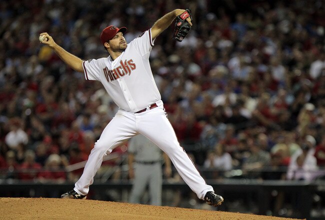 PHOENIX, AZ - OCTOBER 04:  Josh Collmenter #55 of the Arizona Diamondbacks pitches in the seventh inning against the Milwaukee Brewers in Game Three of the National League Division Series at Chase Field on October 4, 2011 in Phoenix, Arizona.  (Photo by Doug Pensinger/Getty Images)