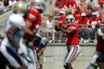 COLUMBUS, OH - SEPTEMBER 3:  Braxton Miller #5 of the Ohio State Buckeyes throws a pass to Christian Bryant #2 of the Ohio State Buckeyes during the third quarter against the Akron Zips on September 3, 2011 at Ohio Stadium in Columbus, Ohio. Ohio State defeated Akron 42-0. (Photo by Kirk Irwin/Getty Images)