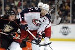 ANAHEIM, CA - FEBRUARY 03:  Rick Nash #61 of the Columbus Blue Jackets fends off Matt Beleskey #39 of the Anaheim Ducks as he carries the puck during the second period at Honda Center on February 3, 2012 in Anaheim, California.  (Photo by Harry How/Getty Images)
