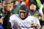 EUGENE, OR - DECEMBER 02 : Quarterback Darron Thomas #5 of the Oregon Ducks celebrates winning the Pac-12 Championship against the UCLA Bruins at Autzen Stadium on December 2, 2011 in Eugene, Oregon. The Ducks won the game 49-31 to earn a berth in the Rose Bowl. (Photo by Steve Dykes/Getty Images)
