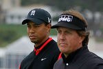PEBBLE BEACH, CA - FEBRUARY 12: (L-R) Tiger Woods and Phil Mickelson wait on the seventh hole tee during the final round of the AT&T Pebble Beach National Pro-Am at Pebble Beach Golf Links on February 12, 2012 in Pebble Beach, California.  (Photo by Jeff Gross/Getty Images)