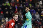 PAMPLONA, SPAIN - FEBRUARY 11:  Pedro Rodriguez of FC Barcelona (R) duels for a high ball with Sergio Fernandez of CA Osasuna during the La Liga match between CA Osasuna and FC Barcelona at the Reyno de Navarra Stadium on February 11, 2012 in Pamplona, Spain.  (Photo by David Ramos/Getty Images)