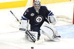 WINNIPEG, CANADA - FEBRUARY 7: Ondrej Pavelec #31 of the Winnipeg Jets blocks a shot on goal during a game against the Toronto Maple Leafs in NHL action at the MTS Centre on February 7, 2012 in Winnipeg, Manitoba, Canada. (Photo by Marianne Helm/Getty Images)