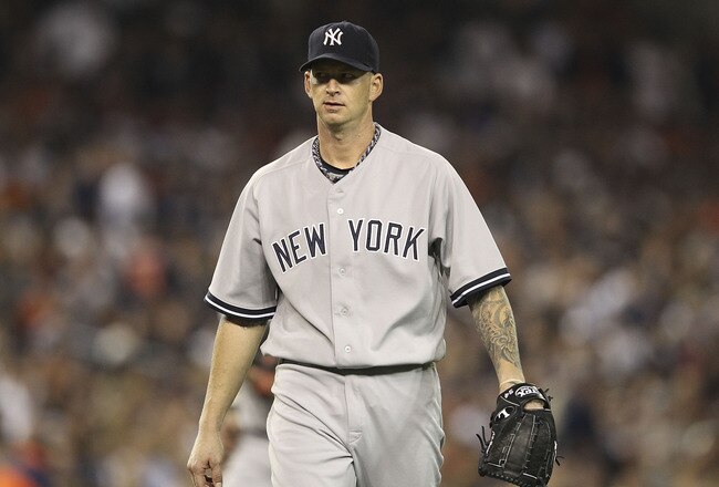 DETROIT, MI - OCTOBER 04:  A J Burnett #34 of the New York Yankees pitches in the sixth inning during Game Four of the American League Divison Series against the Detroit Tigers at Comerica Park on October 4, 2011 in Detroit, Michigan. The Yankees defeated the Tigers 10-1.  (Photo by Leon Halip/Getty Images)