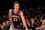 LOS ANGELES, CA - JANUARY 10:  Steve Nash #13 of the Phoenix Suns drives with the ball against the Los Angeles Lakers at Staples Center on January 10, 2012 in Los Angeles, California.  The Lakers won 99-83. NOTE TO USER: User expressly acknowledges and agrees that, by downloading and or using this photograph, User is consenting to the terms and conditions of the Getty Images License Agreement.  (Photo by Stephen Dunn/Getty Images)