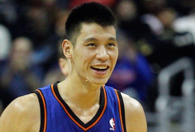 WASHINGTON, DC - FEBRUARY 08:  Jeremy Lin #17 of the New York Knicks smiles after scoring against the Washington Wizards during the second half at Verizon Center on February 8, 2012 in Washington, DC.   NOTE TO USER: User expressly acknowledges and agrees that, by downloading and or using this photograph, User is consenting to the terms and conditions of the Getty Images License Agreement.  (Photo by Rob Carr/Getty Images)
