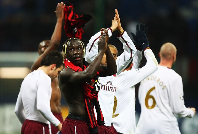 MILAN, ITALY - MARCH 04:  PBakari Sagna of Arsenal celebrates winning the UEFA Champions League 1st knockout round 2nd leg match between AC Milan and Arsenal at the San Siro stadium on March 4, 2008 in Milan, Italy.  (Photo by Mike Hewitt/Getty Images)