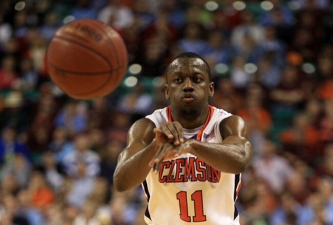 GREENSBORO, NC - MARCH 11:  Andre Young #11 of the Clemson Tigers passes the ball against the Boston College Eagles during the first half in the quarterfinals of the 2011 ACC men's basketball tournament at the Greensboro Coliseum on March 11, 2011 in Greensboro, North Carolina.  (Photo by Streeter Lecka/Getty Images)