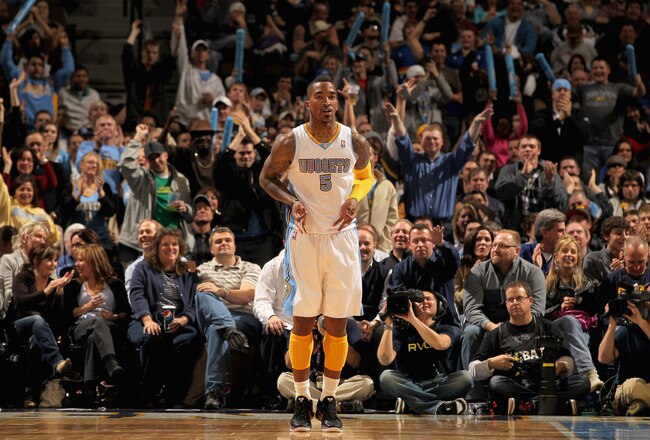 DENVER, CO - JANUARY 13:  J.R. Smith #5 of the Denver Nuggets celebrates a three point basket against the Miami Heat at the Pepsi Center on January 13, 2011 in Denver, Colorado. The Nuggets defeated the Heat 130-102. NOTE TO USER: User expressly acknowledges and agrees that, by downloading and or using this photograph, User is consenting to the terms and conditions of the Getty Images License Agreement.  (Photo by Doug Pensinger/Getty Images)