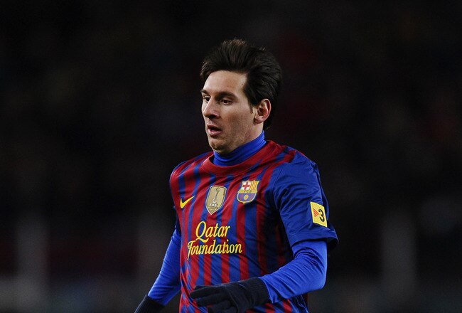 BARCELONA, SPAIN - FEBRUARY 08:  Lionel Messi of FC Barcelona runs during the Copa del Rey Semi Final 2nd leg match between FC Barcelona and Valencia  at Nou Camp on February 8, 2012 in Barcelona, Spain.  (Photo by David Ramos/Getty Images)