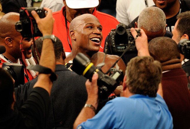 LAS VEGAS - MAY 01:  Floyd Mayweather Jr. reacts after defeating Shane Mosley by unanimous decision after the welterweight fight at the MGM Grand Garden Arena on May 1, 2010 in Las Vegas, Nevada.  (Photo by Ethan Miller/Getty Images)