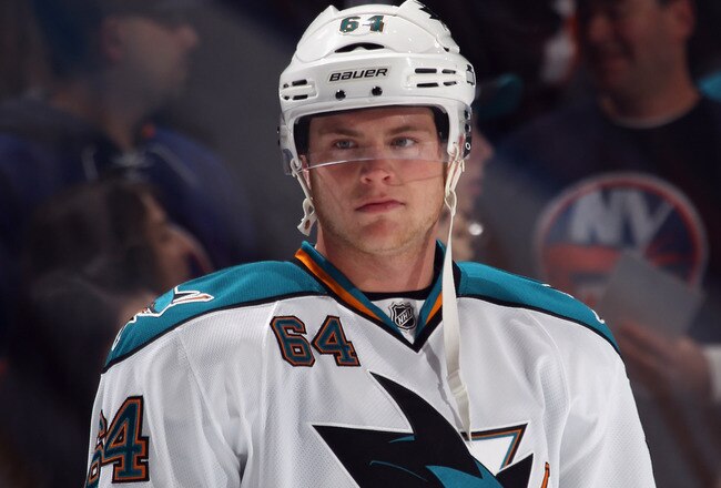 UNIONDALE, NY - OCTOBER 29:  Jamie McGinn #64 of the San Jose Sharks skates against the New York Islanders at the Nassau Veterans Memorial Coliseum on October 29, 2011 in Uniondale, New York. The Sharks defeated the Islanders 3-2 in overtime.  (Photo by Bruce Bennett/Getty Images)