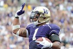 SEATTLE, WA - SEPTEMBER 24:  Chris Polk #1 of the Washington Huskies celebrates his touchdown for a 7-7 score against the California Golden Bears during the first quarter at Husky Stadium on September 24, 2011 in Seattle, Washington.  (Photo by Harry How/Getty Images)