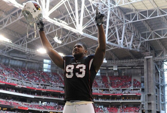 GLENDALE, AZ - NOVEMBER 06:  Calais Campbell #93 of the Arizona Cardinals pumps up the crowd prior to kick off against the St Louis Rams at University of Phoenix Stadium on November 6, 2011 in Glendale, Arizona.  (Photo by Norm Hall/Getty Images)