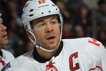 UNIONDALE, NY - DECEMBER 29:  Jarome Iginla #12 of the Calgary Flames skates against the New York Islanders at the Nassau Veterans Memorial Coliseum on December 29, 2011 in Uniondale, New York. The Islanders defeated the Flames 3-1.  (Photo by Bruce Bennett/Getty Images)