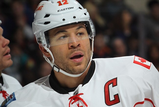 UNIONDALE, NY - DECEMBER 29:  Jarome Iginla #12 of the Calgary Flames skates against the New York Islanders at the Nassau Veterans Memorial Coliseum on December 29, 2011 in Uniondale, New York. The Islanders defeated the Flames 3-1.  (Photo by Bruce Bennett/Getty Images)