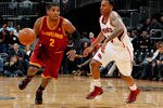 ATLANTA, GA - JANUARY 21:  Kyrie Irving #2 of the Cleveland Cavaliers against Jeff Teague #0 of the Atlanta Hawks at Philips Arena on January 21, 2012 in Atlanta, Georgia.  NOTE TO USER: User expressly acknowledges and agrees that, by downloading and or using this photograph, User is consenting to the terms and conditions of the Getty Images License Agreement.  (Photo by Kevin C. Cox/Getty Images)