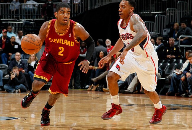 ATLANTA, GA - JANUARY 21:  Kyrie Irving #2 of the Cleveland Cavaliers against Jeff Teague #0 of the Atlanta Hawks at Philips Arena on January 21, 2012 in Atlanta, Georgia.  NOTE TO USER: User expressly acknowledges and agrees that, by downloading and or using this photograph, User is consenting to the terms and conditions of the Getty Images License Agreement.  (Photo by Kevin C. Cox/Getty Images)