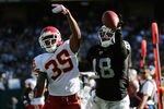 OAKLAND, CA - OCTOBER 23:  Louis Murphy #18 of the Oakland Raiders can't catch up to this pass thrown by Carson Palmer #3 over Brandon Carr #39 of the Kansas City Chiefs at O.co Coliseum on October 23, 2011 in Oakland, California.  (Photo by Thearon W. Henderson/Getty Images)