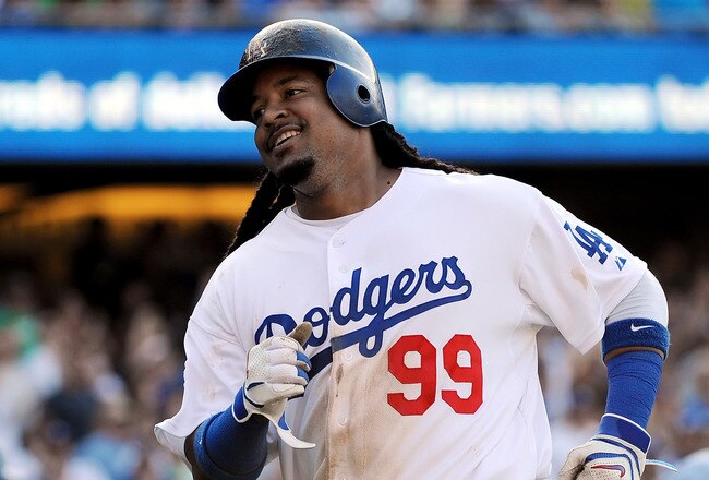 LOS ANGELES - JUNE 26:  Manny Ramirez #99 of the Los Angeles Dodgers scores in the fourth inning against the New York Yankees on June 26, 2010 at Dodger Stadium in Los Angeles, California.  (Photo by Lisa Blumenfeld/Getty Images)