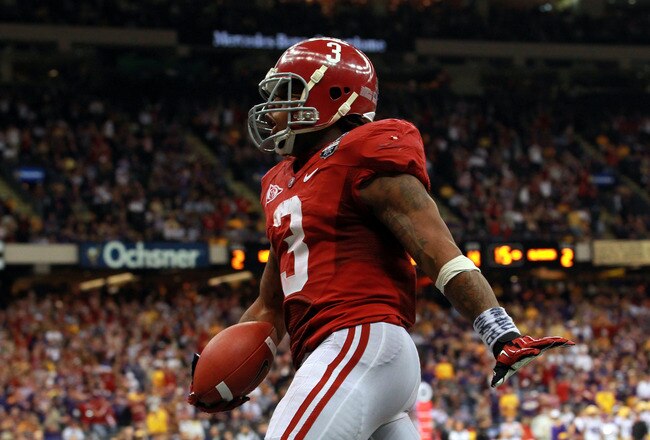 NEW ORLEANS, LA - JANUARY 09:  Trent Richardson #3 of the Alabama Crimson Tide celebrates after scoring a touchdown in the fourth quarter against the Louisiana State University Tigers during the 2012 Allstate BCS National Championship Game at Mercedes-Benz Superdome on January 9, 2012 in New Orleans, Louisiana.  (Photo by Ronald Martinez/Getty Images)