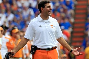 GAINESVILLE, FL - SEPTEMBER 17:  Head coach of the Tennessee Volunteers Derek Dooley speaks turnover his players during a game against the Florida Gators at Ben Hill Griffin Stadium on September 17, 2011 in Gainesville, Florida.  (Photo by Sam Greenwood/Getty Images)