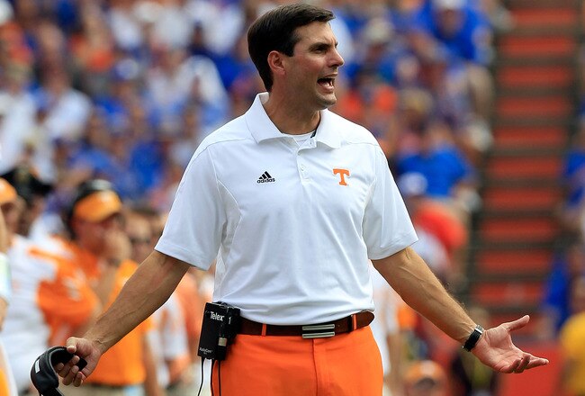 GAINESVILLE, FL - SEPTEMBER 17:  Head coach of the Tennessee Volunteers Derek Dooley speaks turnover his players during a game against the Florida Gators at Ben Hill Griffin Stadium on September 17, 2011 in Gainesville, Florida.  (Photo by Sam Greenwood/Getty Images)