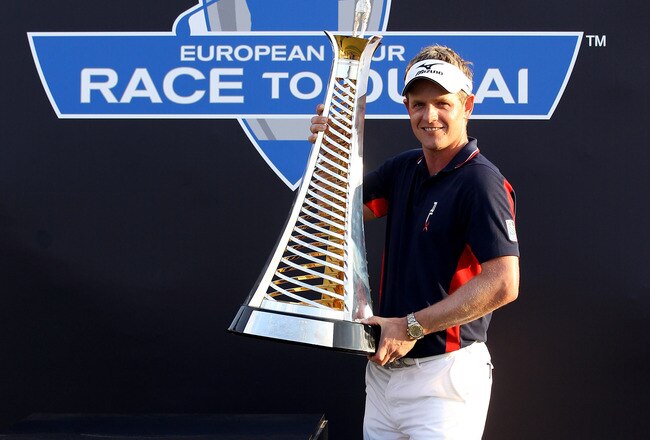 DUBAI, UNITED ARAB EMIRATES - DECEMBER 11:  Luke Donald of England poses with the trophy after winning The Race To Dubai at the Dubai World Championship on the Earth Course, Jumeirah Golf Estates on December 11, 2011 in Dubai, United Arab Emirates.  (Photo by Andrew Redington/Getty Images)