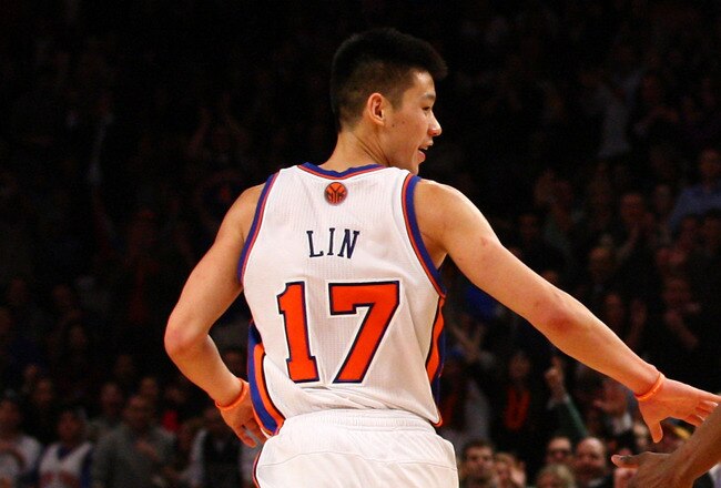 NEW YORK, NY - FEBRUARY 10:  (L-R) Jeremy Lin #17 and Iman Shumpert #21 of the New York Knicks celebrate a play against the Los Angeles Lakers at Madison Square Garden on February 10, 2012 in New York City.  NOTE TO USER: User expressly acknowledges and agrees that, by downloading and or using this photograph, User is consenting to the terms and conditions of the Getty Images License Agreement.  (Photo by Chris Chambers/Getty Images)