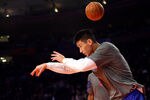 NEW YORK, NY - FEBRUARY 10:  Jeremy Lin #17 of the New York Knicks warms up prior to playing against the Los Angeles Lakers at Madison Square Garden on February 10, 2012 in New York City.  NOTE TO USER: User expressly acknowledges and agrees that, by downloading and or using this photograph, User is consenting to the terms and conditions of the Getty Images License Agreement.  (Photo by Chris Chambers/Getty Images)