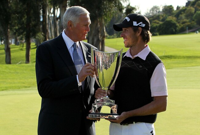 PACIFIC PALISADES, CA - FEBRUARY 20:  Tournament execuctive director and NBA legend Jerry West (L) and champion Aaron Baddeley of Australia talk during trophy ceremonies after the final round of the Northern Trust Open at Riviera Country Club on February 20, 2011 in Pacific Palisades, California.  (Photo by Stephen Dunn/Getty Images)